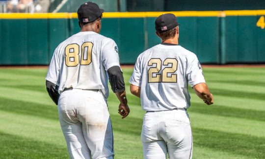 Kumar Rocker (80) and Jack Leiter (22) jog side by side. (Vanderbilt Athletics).