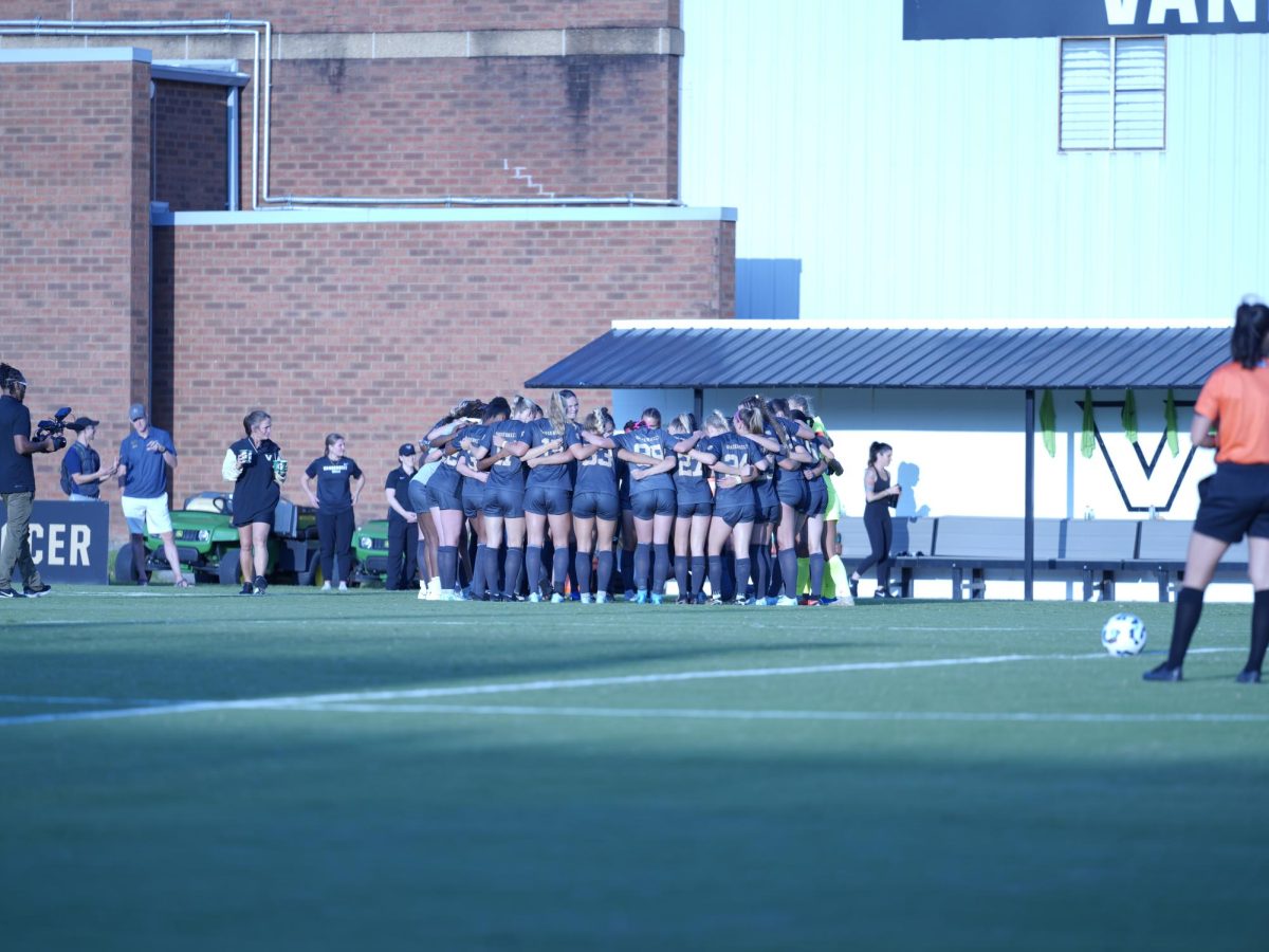 The full team huddles before kickoff as photographed on Sept. 8, 2024. (Hustler Multimedia/Nathan Malkin)
