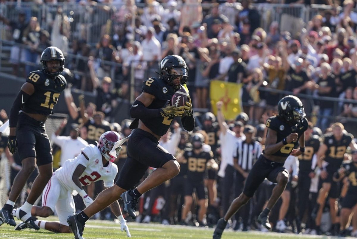 Randon Fontenette runs with the ball after intercepting it, as photographed on Oct. 5, 2024. (Hustler Multimedia/Nikita Rohila)