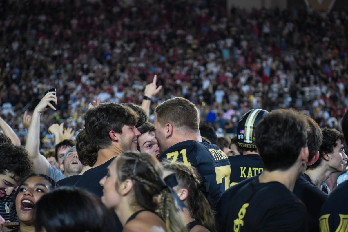  Fans and players celebrate a Vanderbilt win against Alabama, as captured on Oct. 5, 2024. (Hustler Multimedia/Savannah Walske)