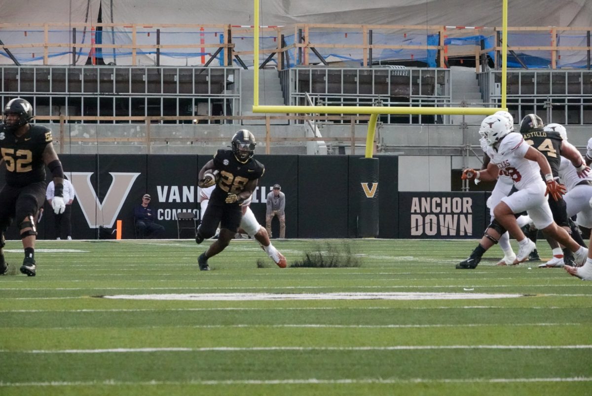 Sedrick Alexander finds a seam in Texas' defense, as photographed on Oct. 26, 2024 (Hustler Multimedia/Jackson Blunt)