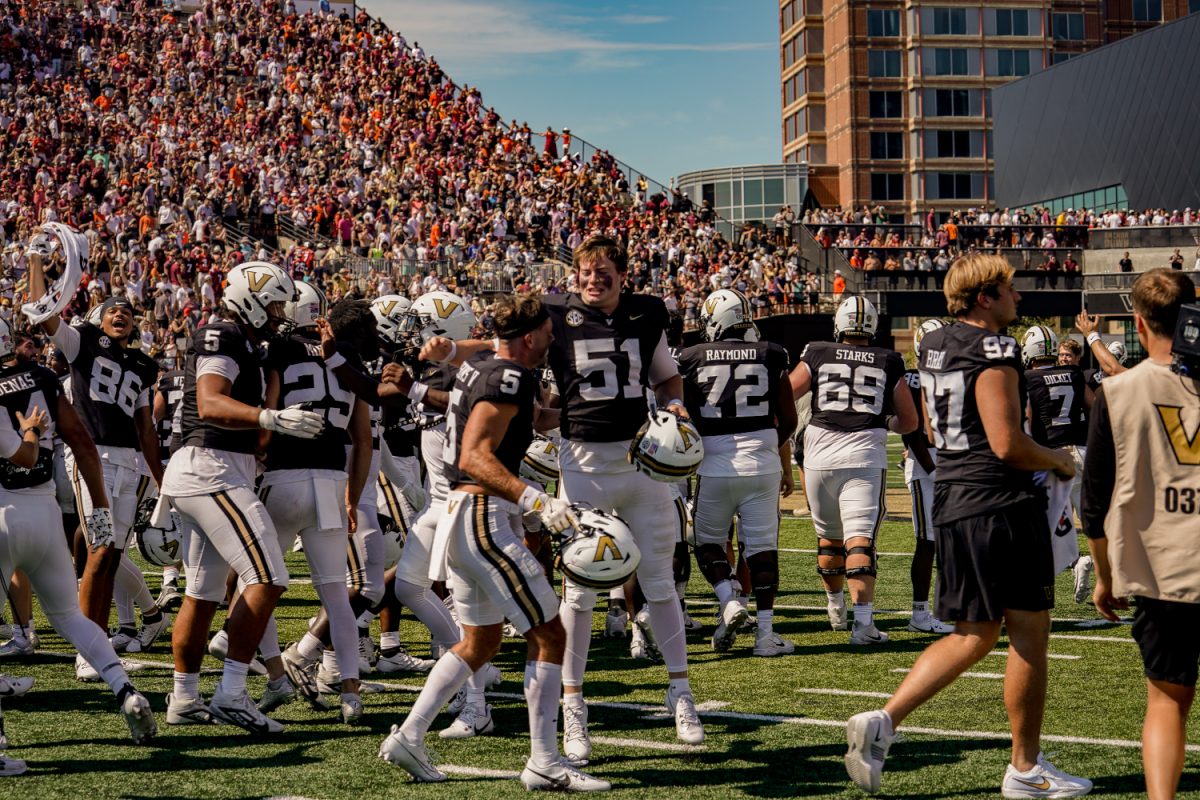 Vanderbilt's football players and staff celebrate together after knocking off Virginia Tech, as photographed on Aug. 31, 2024. (Hustler Multimedia/Miguel Beristain)