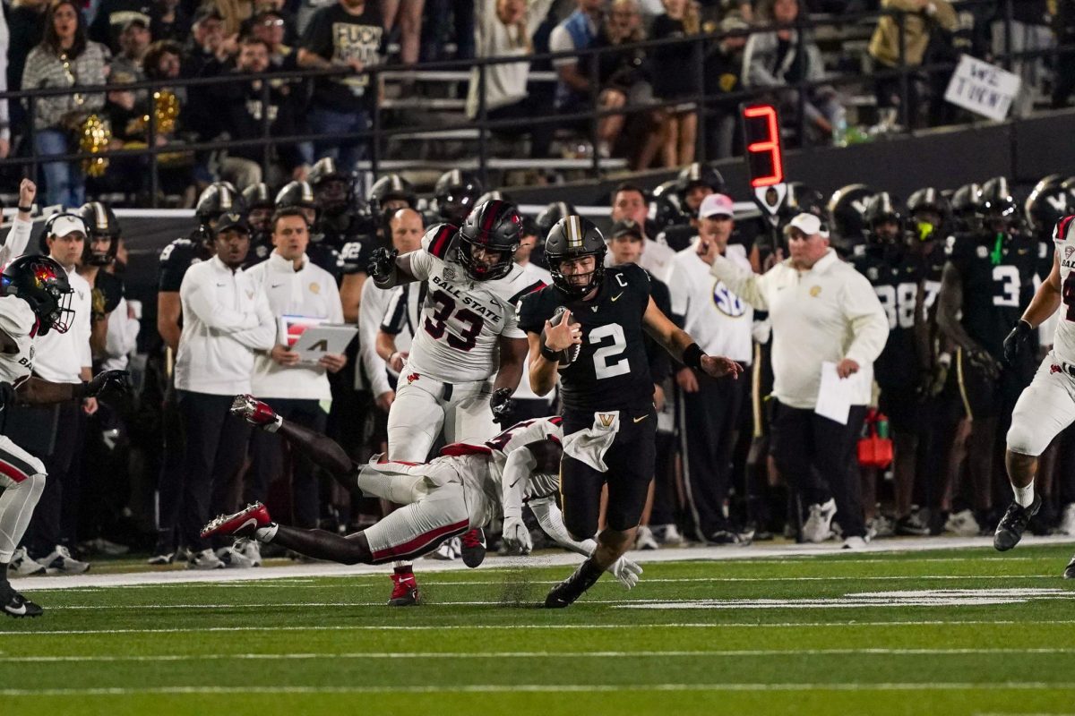 Diego Pavia darts past Ball State's defenders, as photographed on Oct. 19, 2024. (Hustler Multimedia/Alondra Moya)