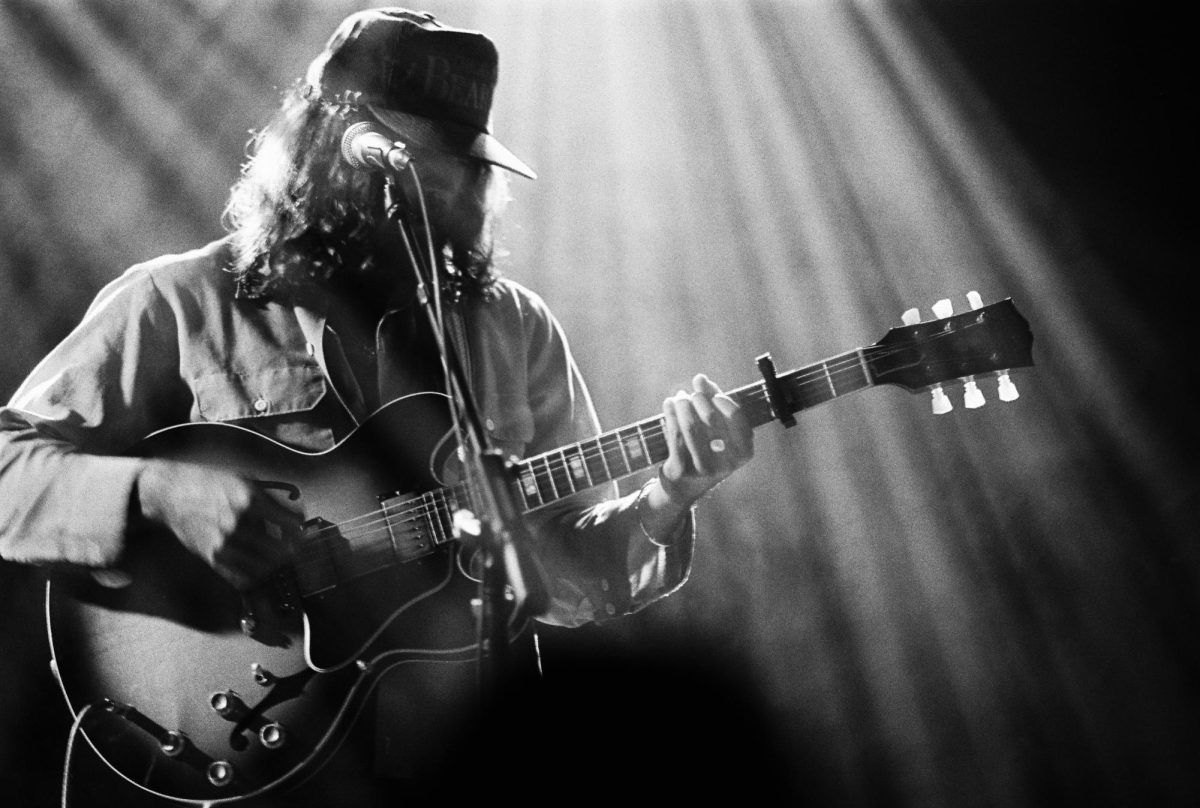 Vocalist Hazlett plays his guitar in Cannery Hall, as photographed on Oct. 20, 2024. (Hustler Multimedia/Jackson Blunt)