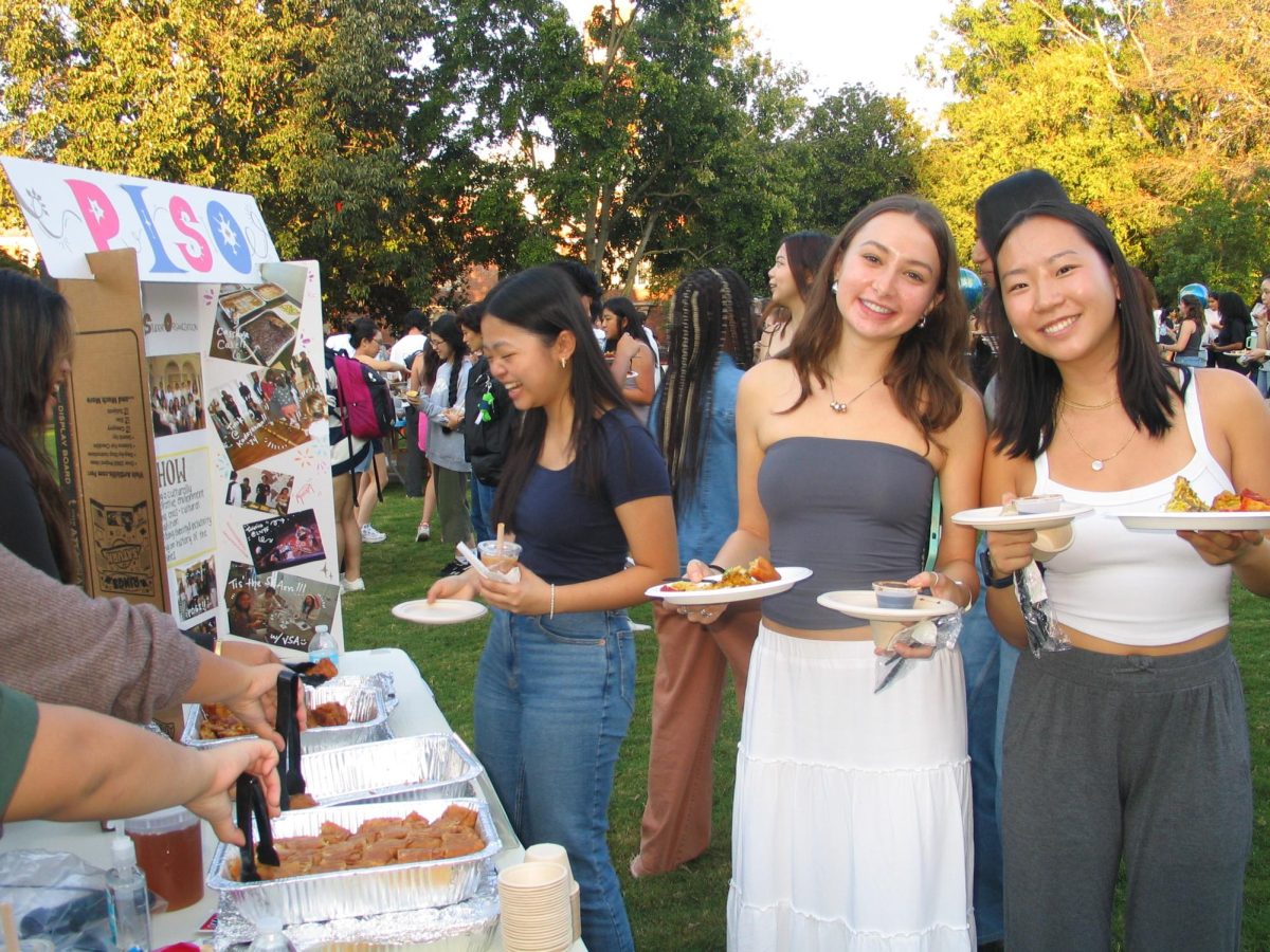 The Philippines Intercultural Student Organization hosts a booth serving Turon and Lumpia, traditional foods from the Philippines, at Vanderbilt’s global Feast Fest, as photographed on Sept. 22, 2024. (Photo Courtesy of Philippines Intercultural Student Organization)
