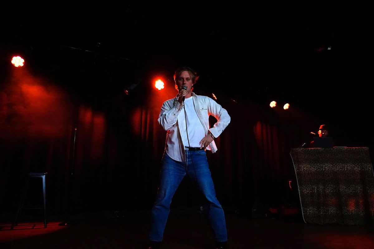 John Early pausing to pose for the camera in the middle of his performance, as photographed on October 19, 2024. (Hustler Multimedia/Emma Smith)