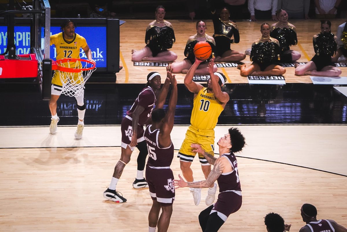 Jordan Williams shoots a jumper against Texas A&M, as photographed on Feb. 13, 2024. (Hustler Multimedia/Nikita Rohila)