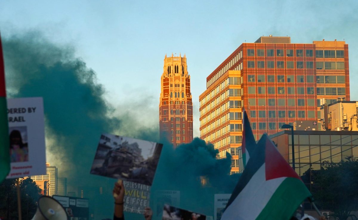 West End Tower with signs and blue smoke in the foreground, as photographed on Oct. 7, 2024. (Hustler Multimedia/George Albu)
