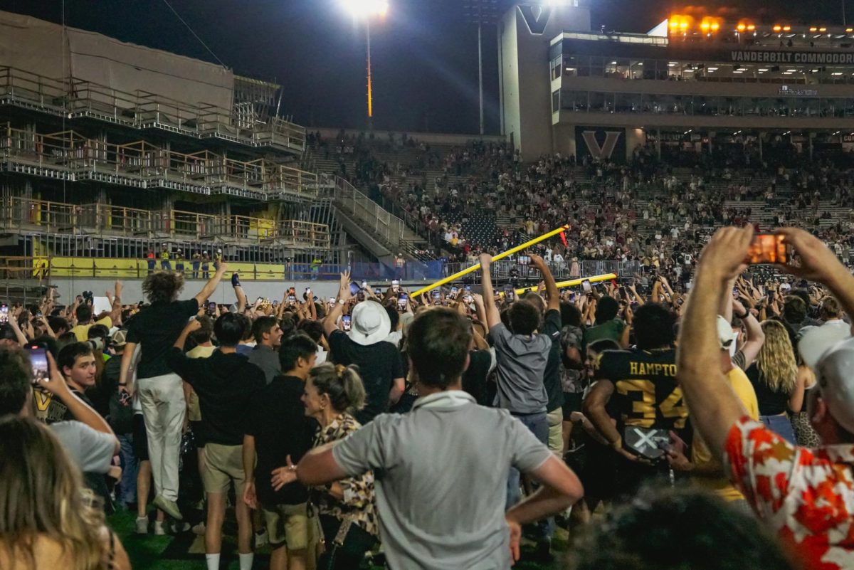 Students tear down the goalposts after upsetting No. 1 Alabama, as photographed on Oct. 5, 2024. (Hustler Multimedia/Nikita Rohila)