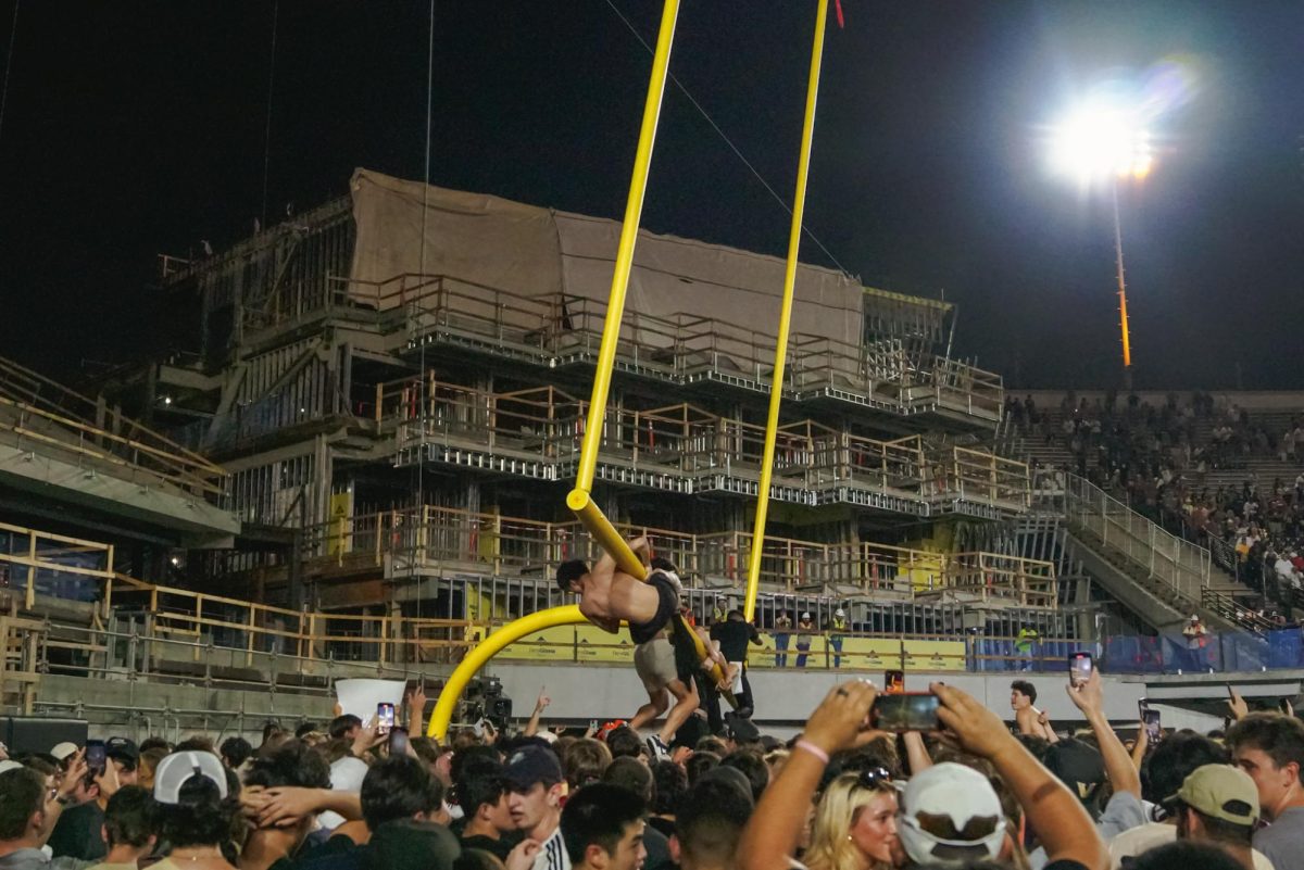 Vanderbilt fans take down the goalpost in FirstBank Stadium as photographed on Oct. 5, 2024. (Hustler Multimedia/Nikita Rohila)