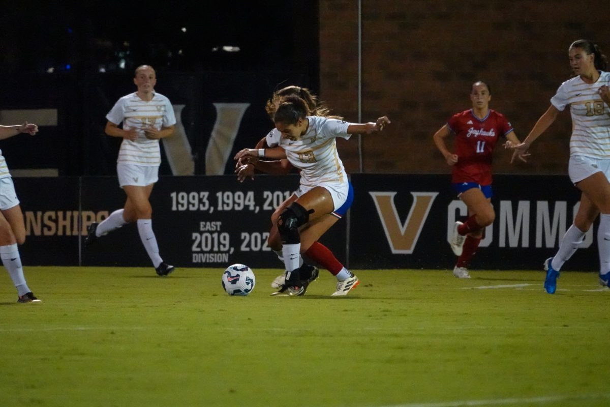 Ella Eggleston fights for the ball during Vanderbilt's match against Kansas, as photographed on Sept. 5, 2024. (Hustler Multimedia/Lana English)