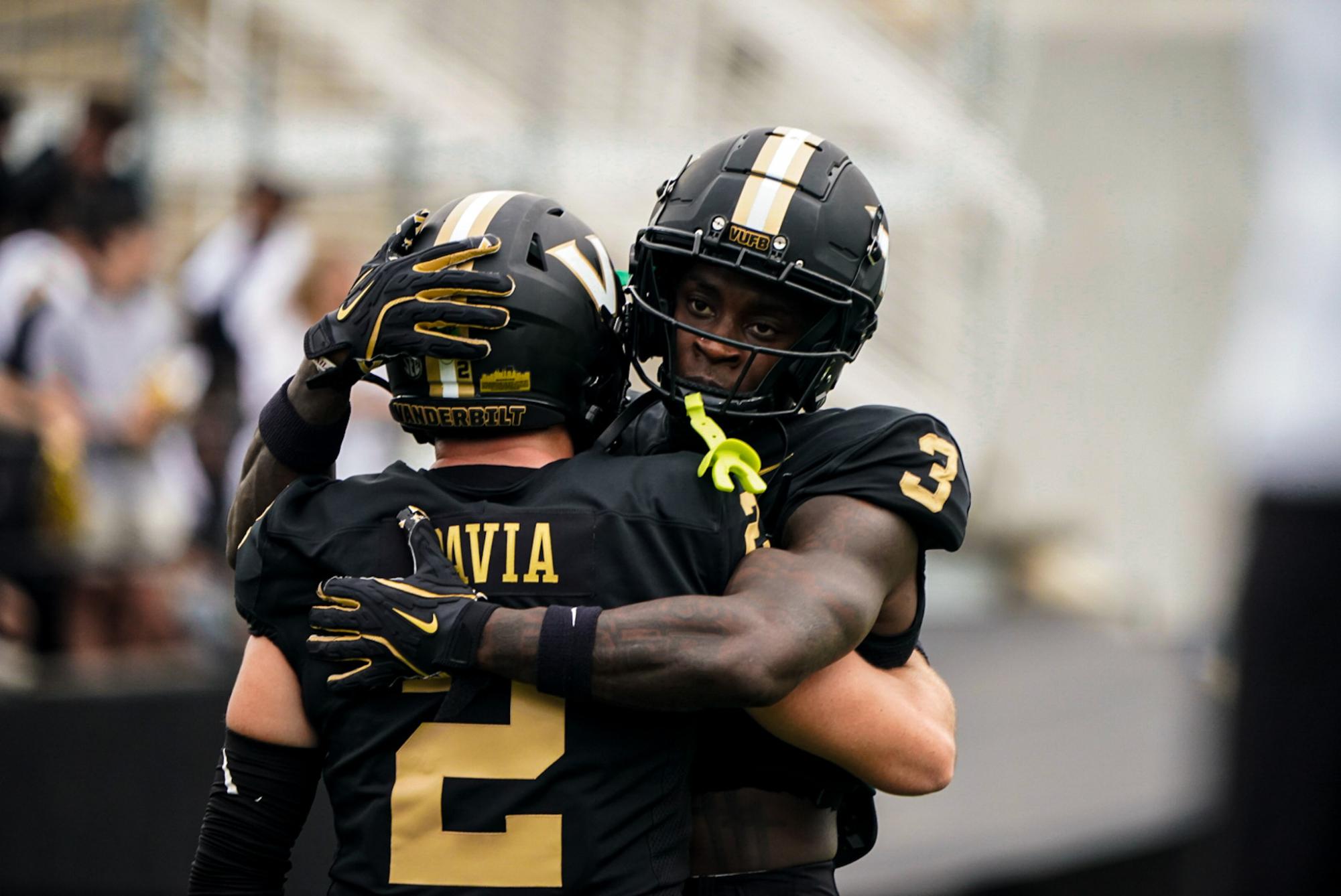 Vanderbilt's Junior Sherrill and Diego Pavia hug each other during the Commodores' matchup against Texas, as photographed on Oct. 26, 2024. (Hustler Multimedia/Michael Tung)