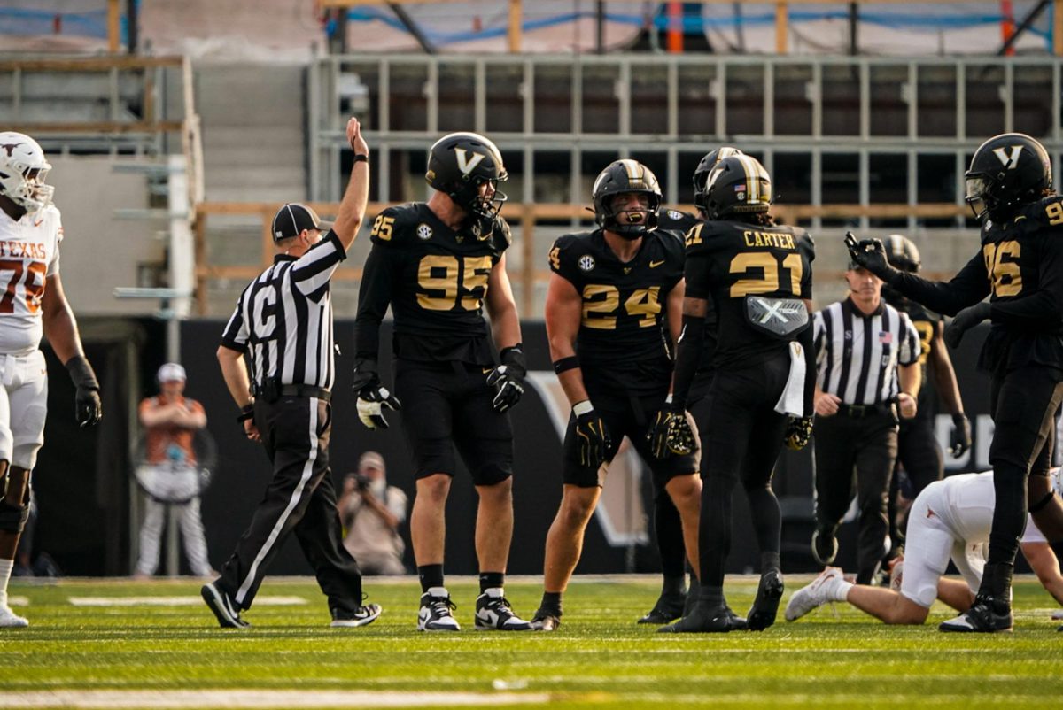 Nick Rinaldi celebrates a sack on Texas QB Quinn Ewers, as photographed on Oct. 26 (Hustler Multimedia/Michael Tung)