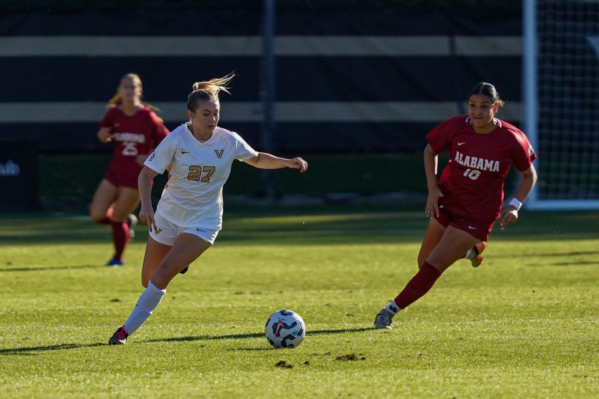 Alex Wagner dribbles the ball past an Alabama player, as photographed on Oct. 27, 2024. (Hustler Multimedia/Savannah Walske)