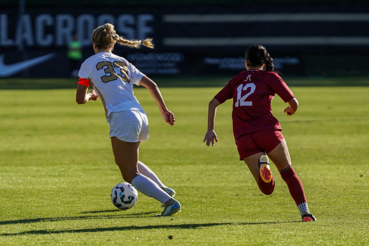 Abi Brighton runs with the ball as an Alabama player trails behind, as captured on Oct. 27, 2024. (Hustler Multimedia/Savannah Walske)