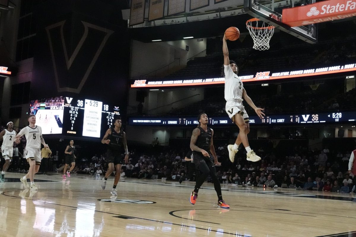 Tyler Tanner slams a dunk down, as photographed on Nov. 4, 2024. (Hustler Multimedia/Megan Landis)