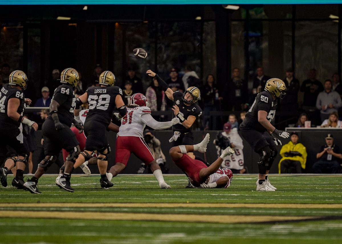 Diego Pavia throws the ball under pressure, as photographed on Nov. 9, 2024. (Hustler Multimedia/Miguel Beristain)