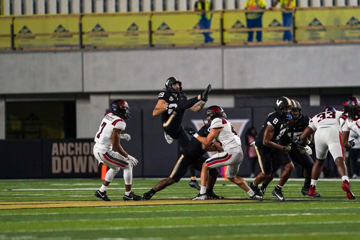 Jesse Micro punts the ball in Vanderbilt's game against Ball State, as photographed on Oct. 19, 2024. (Hustler Multimedia/Alondra Moya)