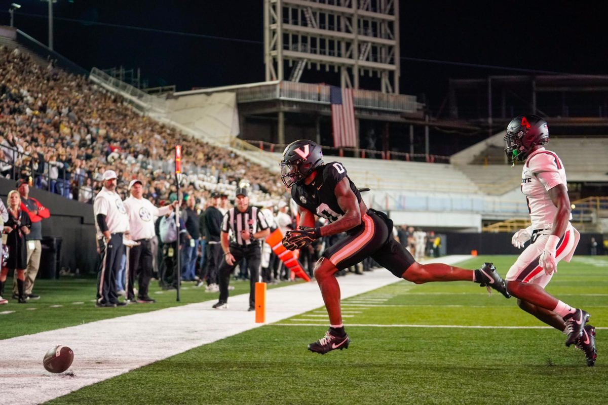 Junior Sherrill narrowly misses a pass from Diego Pavia, as captured on Oct. 19, 2024. (Hustler Multimedia/Lana English)