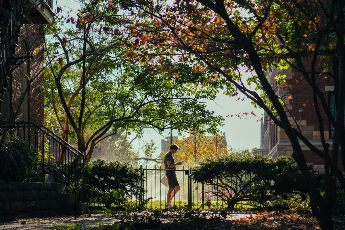 A man walks on a pathway near Oliver C. Carmichael College, as photographed on Oct. 23, 2024. (Hustler Multimedia/Savannah Walske)