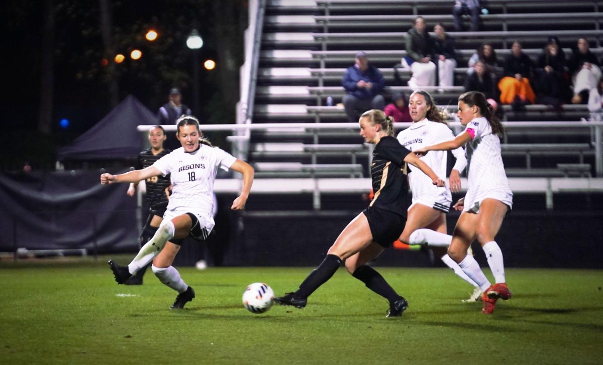 Lipscomb's #18 tries to guard as a Vandy player goes in for the kick, photographed on Nov. 15, 2024. (Hustler Multimedia/ George Albu)