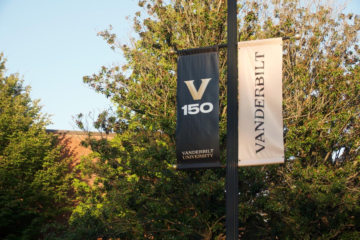 Vanderbilt 150 banner hangs on street pole in front of fall foliage, as photographed on Oct. 3, 2024. (Hustler Multimedia/Abby Hoelscher)