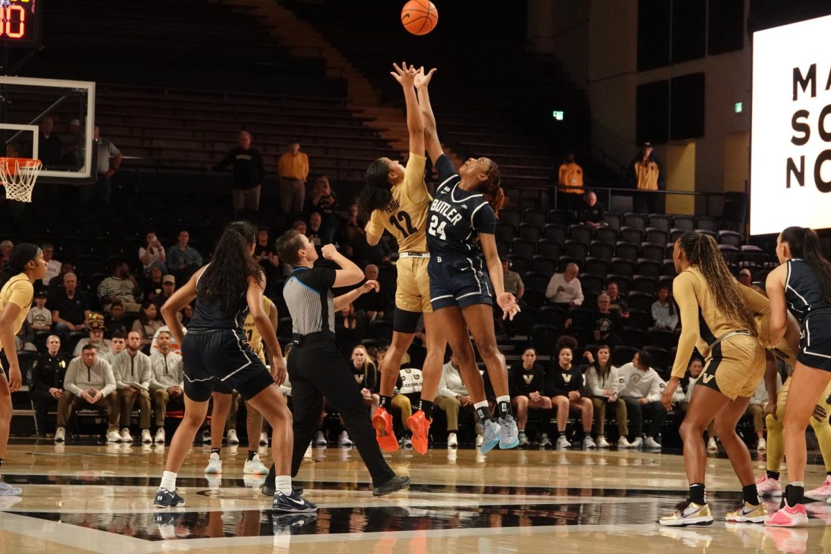 Khamil Pierre goes against a Butler player for the opening jump ball, as photographed on Nov. 17, 2024. (Hustler Multimedia/Sofia Healy)