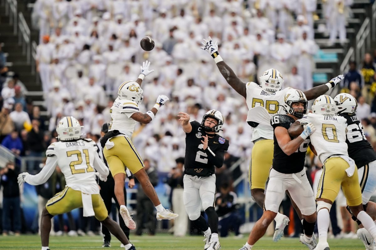 Diego Pavia throws a pass over Georgia Tech defenders, as photographed on Dec. 27, 2024. (Hustler Multimedia/Miguel Beristain)