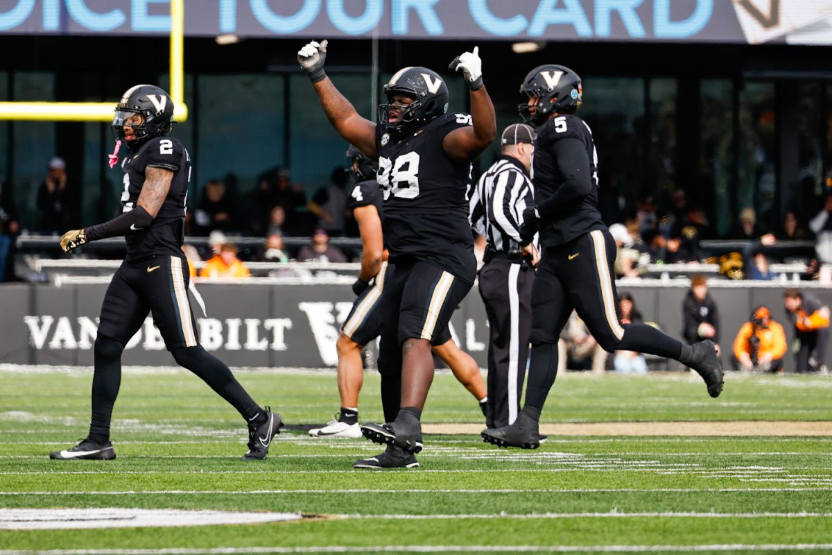 De'Marion Thomas celebrates after a play, as photographed on Nov. 30, 2024. (Hustler Multimedia/Barrie Barto)