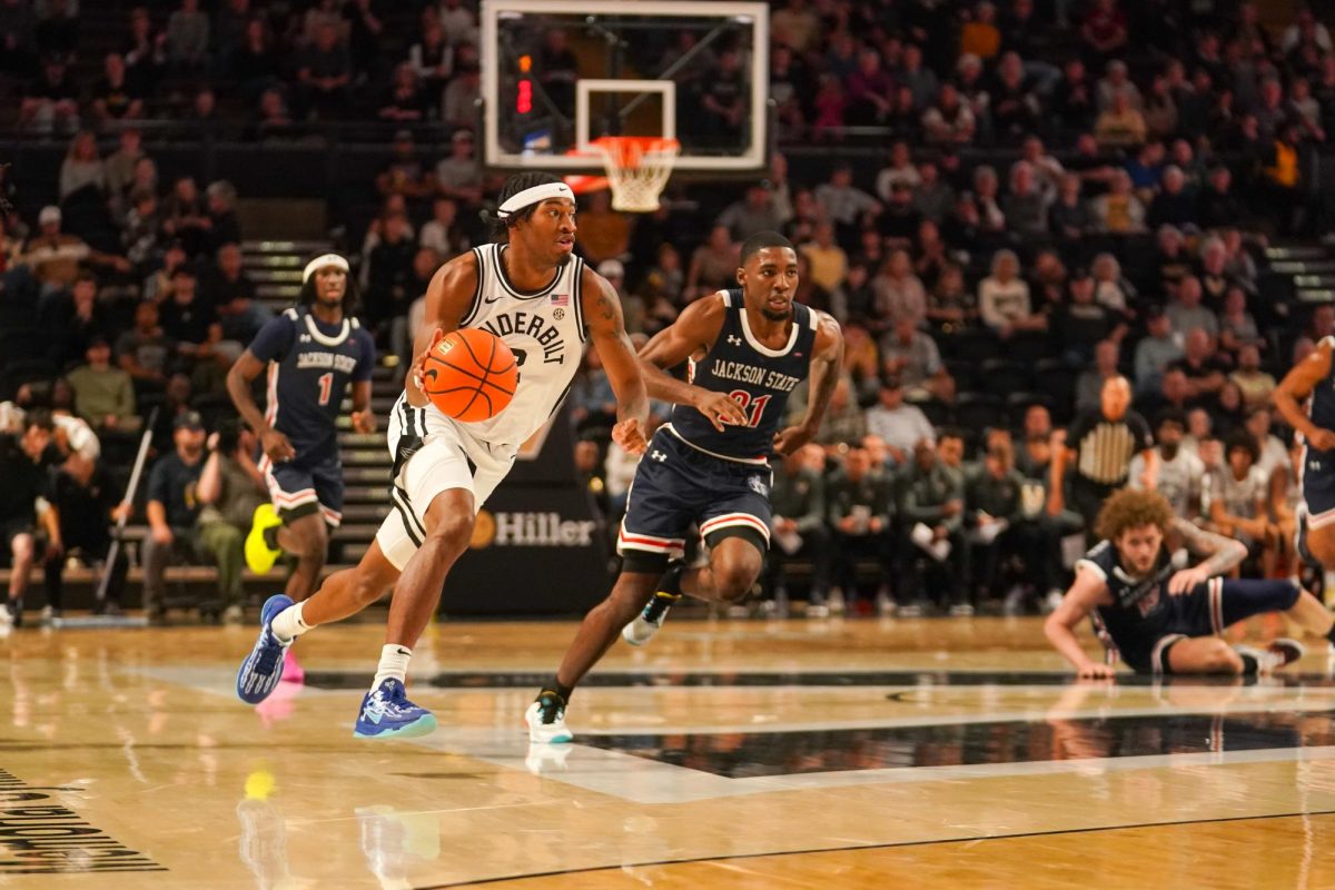 MJ Collins Jr. pushes the ball on the fast break, as photographed on Nov. 16, 2024. (Hustler Staff/Connor Campbell)
