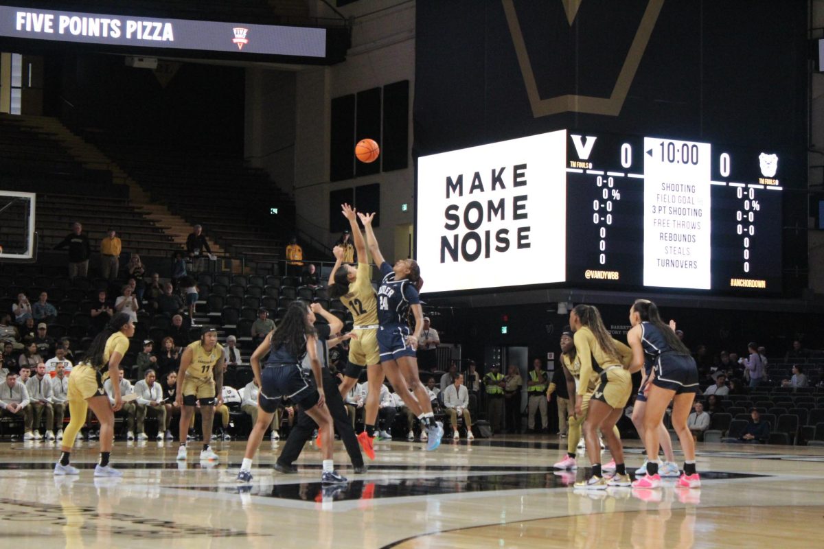 Pierre challenges Butler forward for the opening tip, as photographed on Nov. 17, 2024. (Hustler Multimedia/Nathan Malkin)
