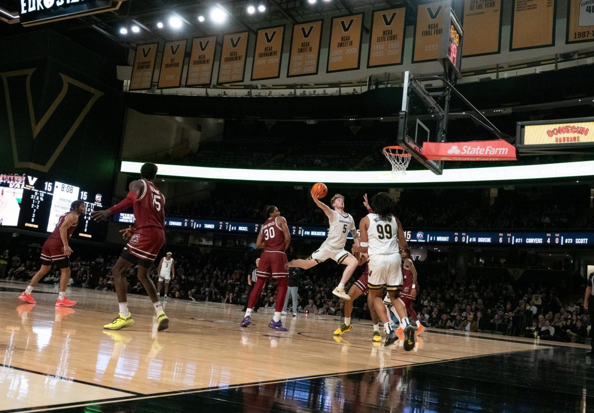 Tyler Nickel soars for a layup attempt, as photographed on Jan. 15, 2024. (Hustler Multimedia/Payton Ohler)