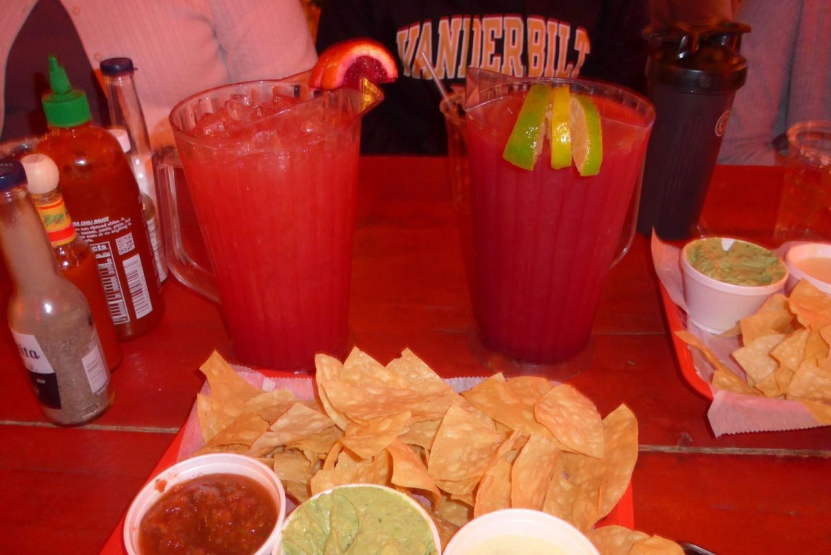 Two pitchers of margaritas sit behind a platter of chips and dips, as photographed on January 16, 2025. (Hustler Staff/Pragya Shah)