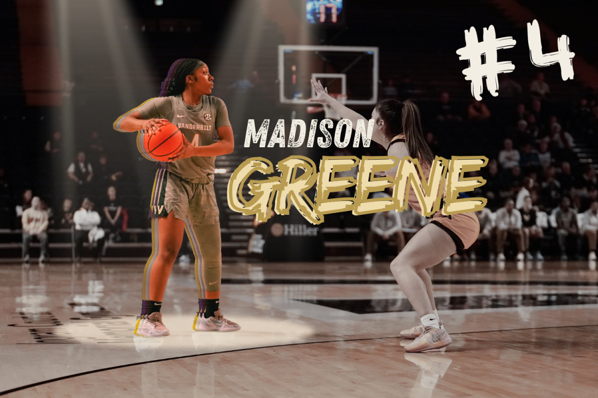 Vanderbilt's Madison Greene stands just outside of the 3-point line with the ball in her hands as a defender guards her. (Hustler Multimedia/Lexie Perez)