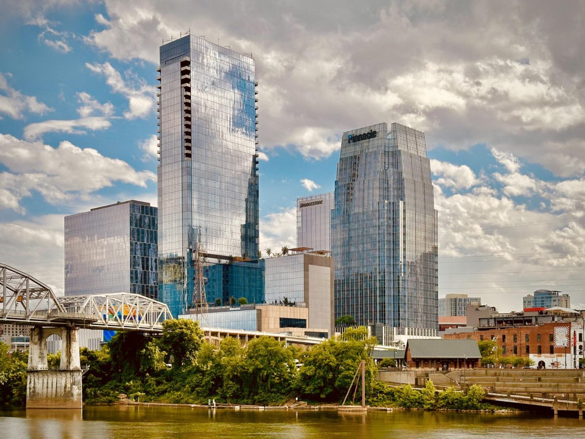 Skyscrapers stand behind the John Seigenthaler Pedestrian Bridge in the South of Broadway district of downtown Nashville, as photographed on Sept. 1, 2024. (Hustler Multimedia/Royce Yang)