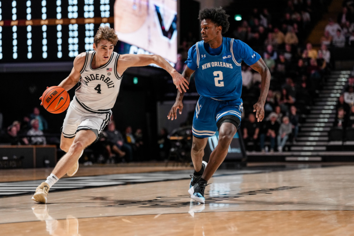 Vanderbilt's Grant Huffman dribbles past a New Orleans defender, as photographed on Dec. 20, 2024. (Vanderbilt Athletics)