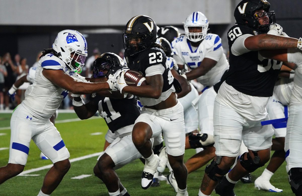 AJ Newberry running through Georgia State defense, as photographed on Sept. 20, 2025. (Hustler Multimedia/Courtney Wu) 
