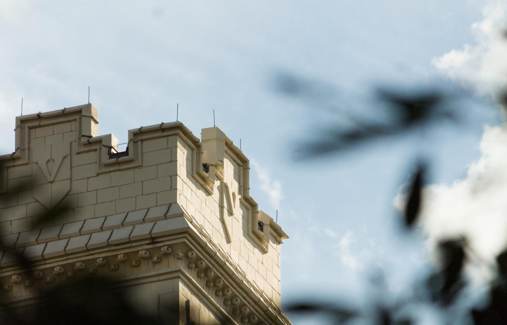 Up-close photograph of the top of the Kirkland Hall clocktower, as photographed on Aug. 29, 2025. (Hustler Multimedia/George Albu) 
