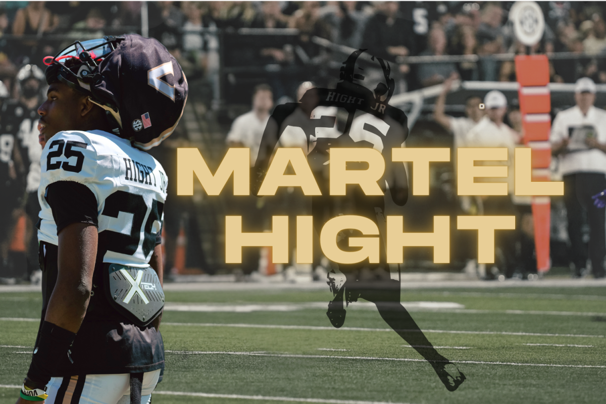 Martel Hight runs a punt return in the background with his name and photo in the foreground. (Hustler Multimedia/Kate Rothermel)