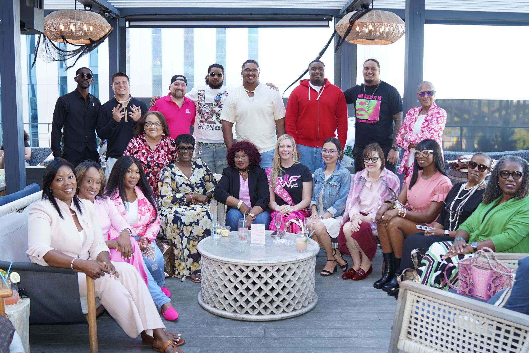 A group photo with two rows of people the first sitting and the other standing taken at the Luncheon hosted by the Jordan White Foundation, as photographed on Oct. 9, 2025. (Photo Courtesy of Carl Larrieu II and Jordan White Foundation)