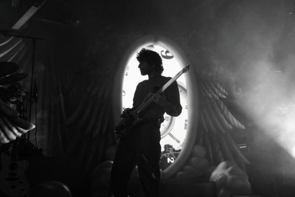 Lewin plays a solo on the electric guitar, as photographed on Oct. 8, 2025. (Hustler Multimedia/Alysia Shang) 