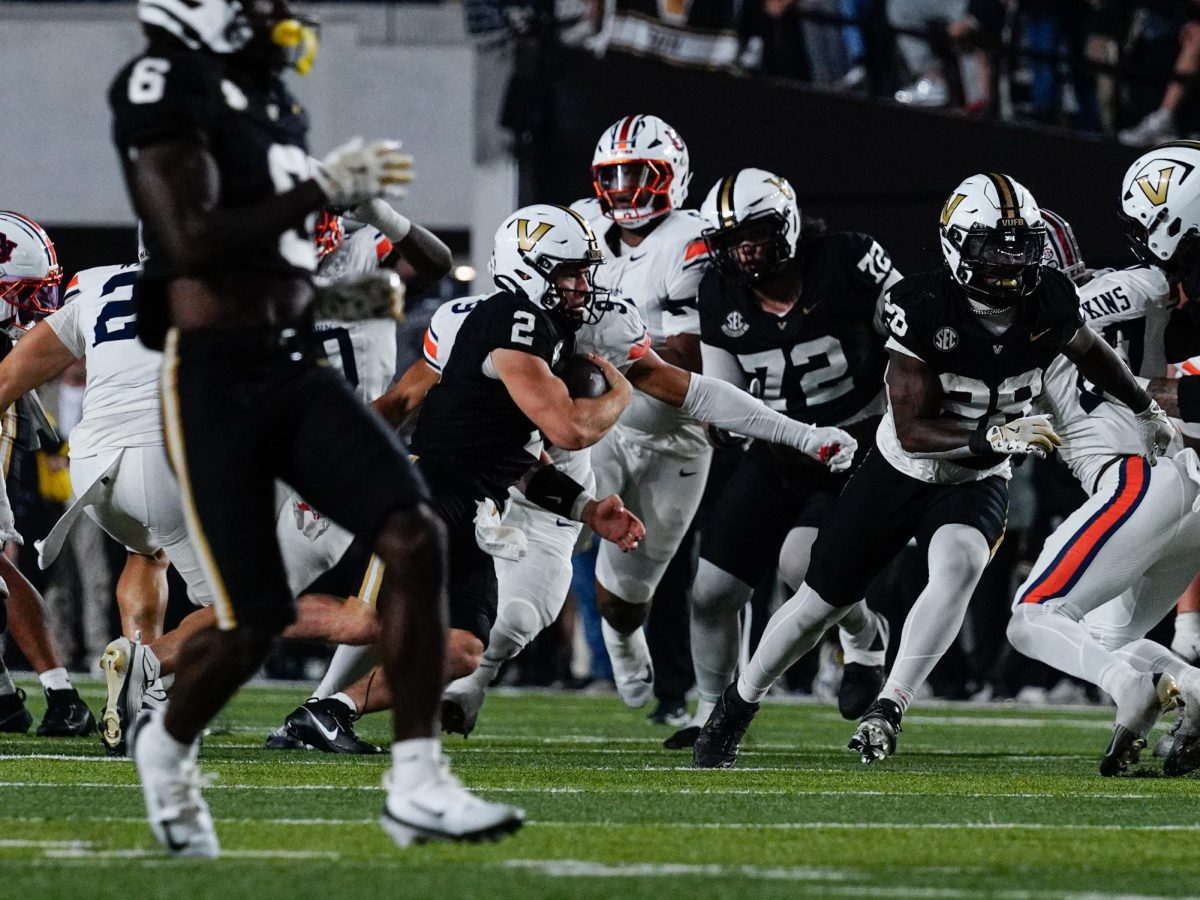 Diego Pavia runs the ball through defensive players, as photographed on Nov. 8, 2025. (Hustler Multimedia/Ophelia Lu) 