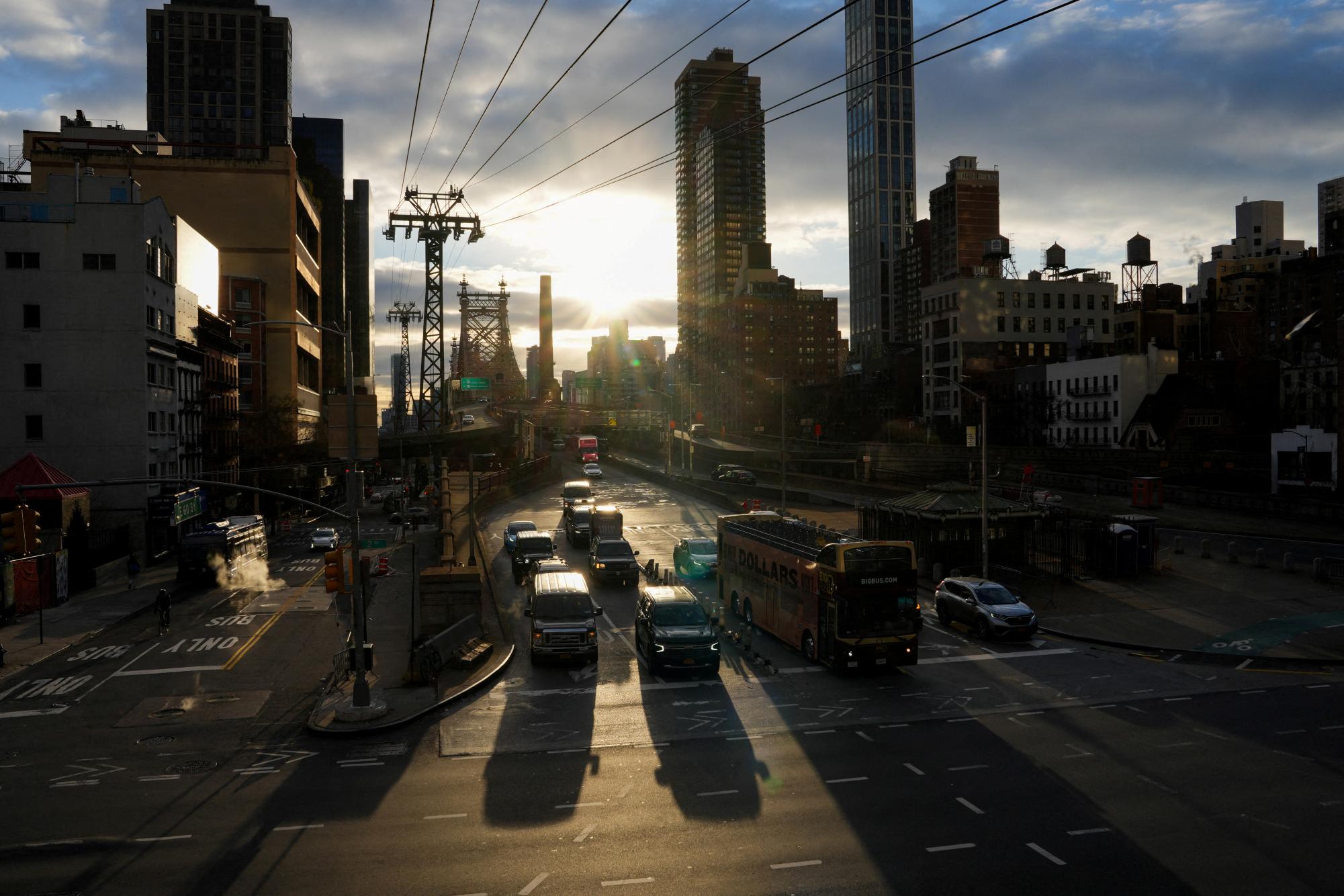 Vehicles enter the Congestion Relief Zone at the Ed Koch Queensboro Bridge on the first day of New York City’s planned congestion pricing program to charge drivers for entering the central business district in Manhattan below 60th street in New York City, U.S., January 5, 2025. REUTERS/Adam Gray
