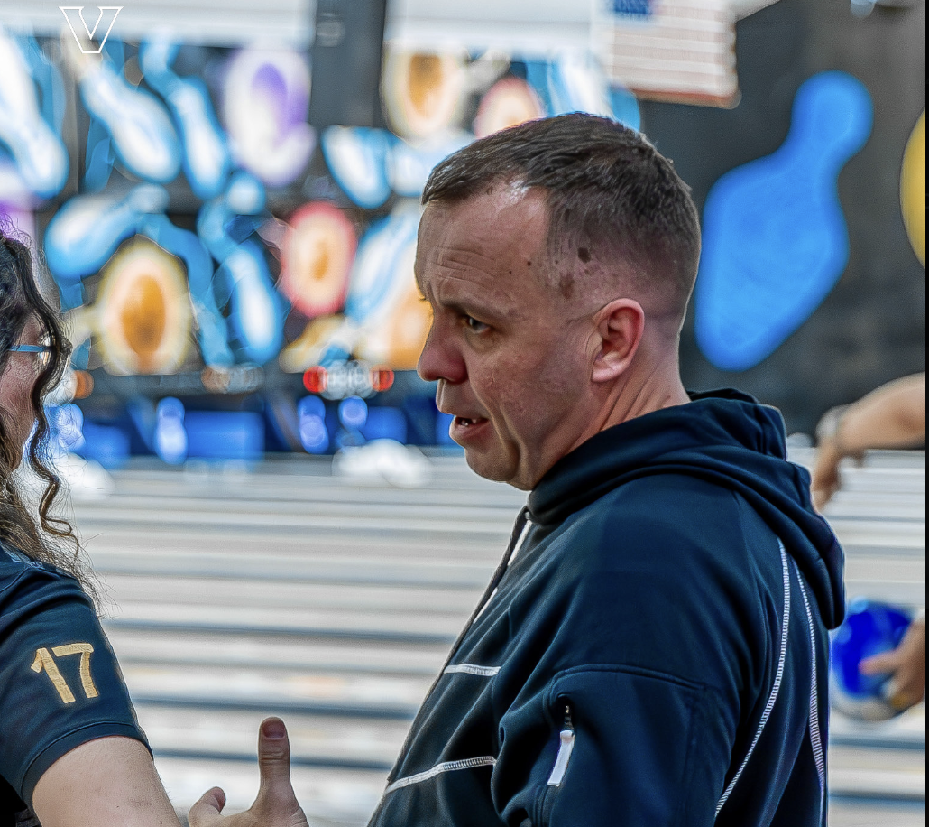 Head coach John Williamson stands next to a player, as photographed on Oct. 6, 2025. (Vanderbilt Athletics)