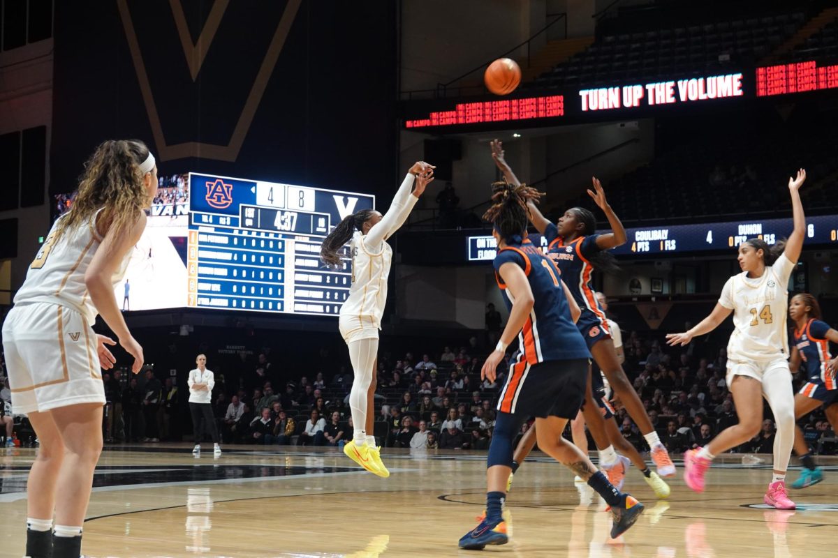 Mikayla Blakes shoots a 3-pointer while an Auburn defender closes out and another watches, as photographed on Jan. 22, 2026. (Hustler Multimedia/Ella Shaham)
