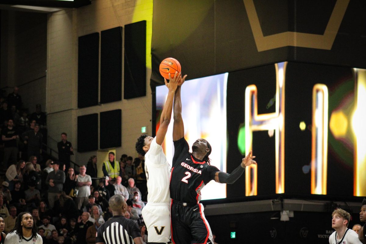 Jalen Washington tips-off, as photographed on Feb. 26, 2026. (Hustler Multimedia / Rachel Loomis)