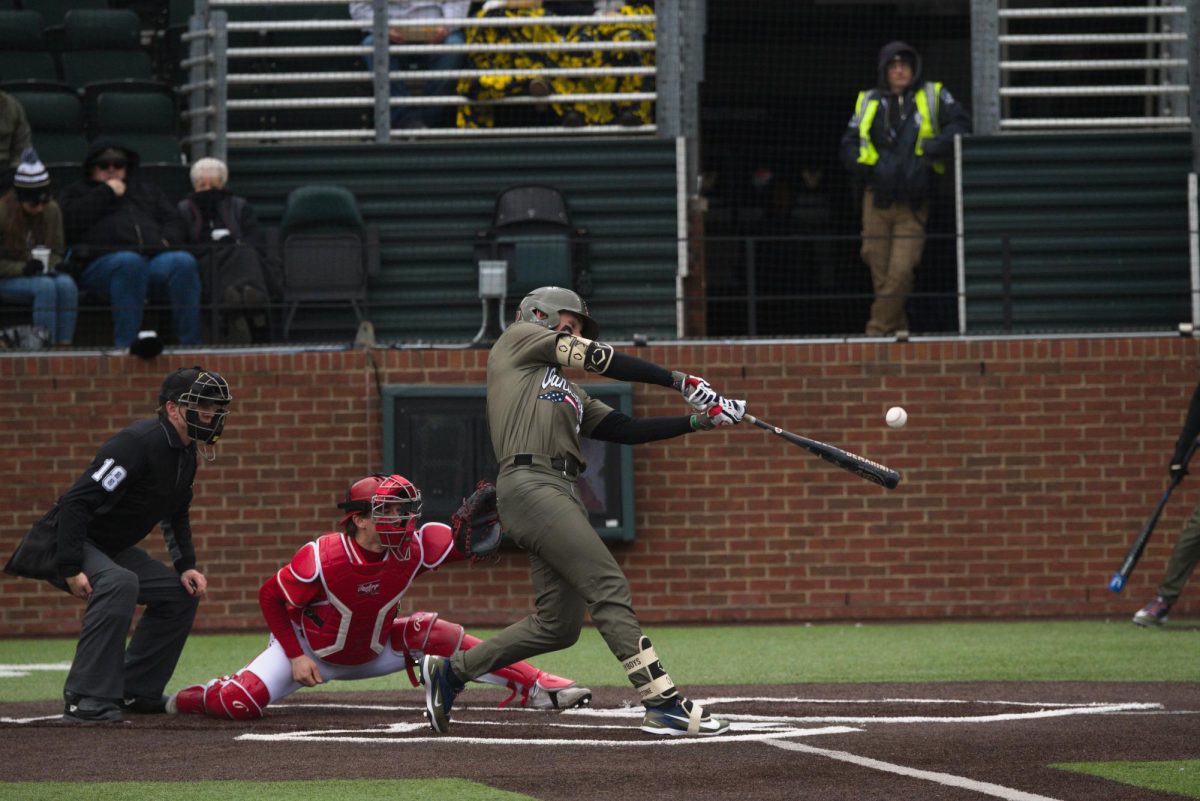 Carter Johnstone swings at an incoming pitch, as photographed onFeb. 22, 2026. (Hustler Multimedia/ Jackson Blunt)