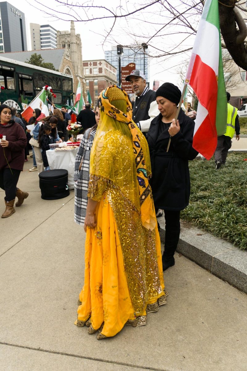 Demonstrators stood in front of the Frist Art Museum Feb. 14 to call for support for freedom in Iran, calling on President Trump to intervene.