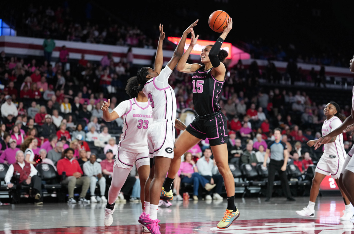 Ndjakalenga Mwenentanda goes up for a contested layup against a Georgia defender, as photographed on Feb. 15, 2026. (Vanderbilt Athletics)