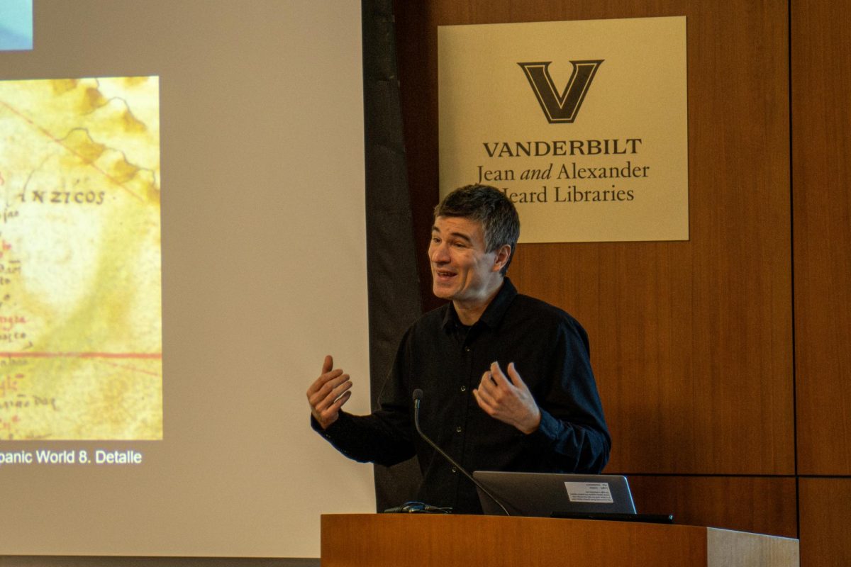 David Wheat speaks at the “Yams and Free Black Society in the Gulf of Guinea” lecture, as photographed Feb. 26. (Hustler Multimedia/Savannah Walske)